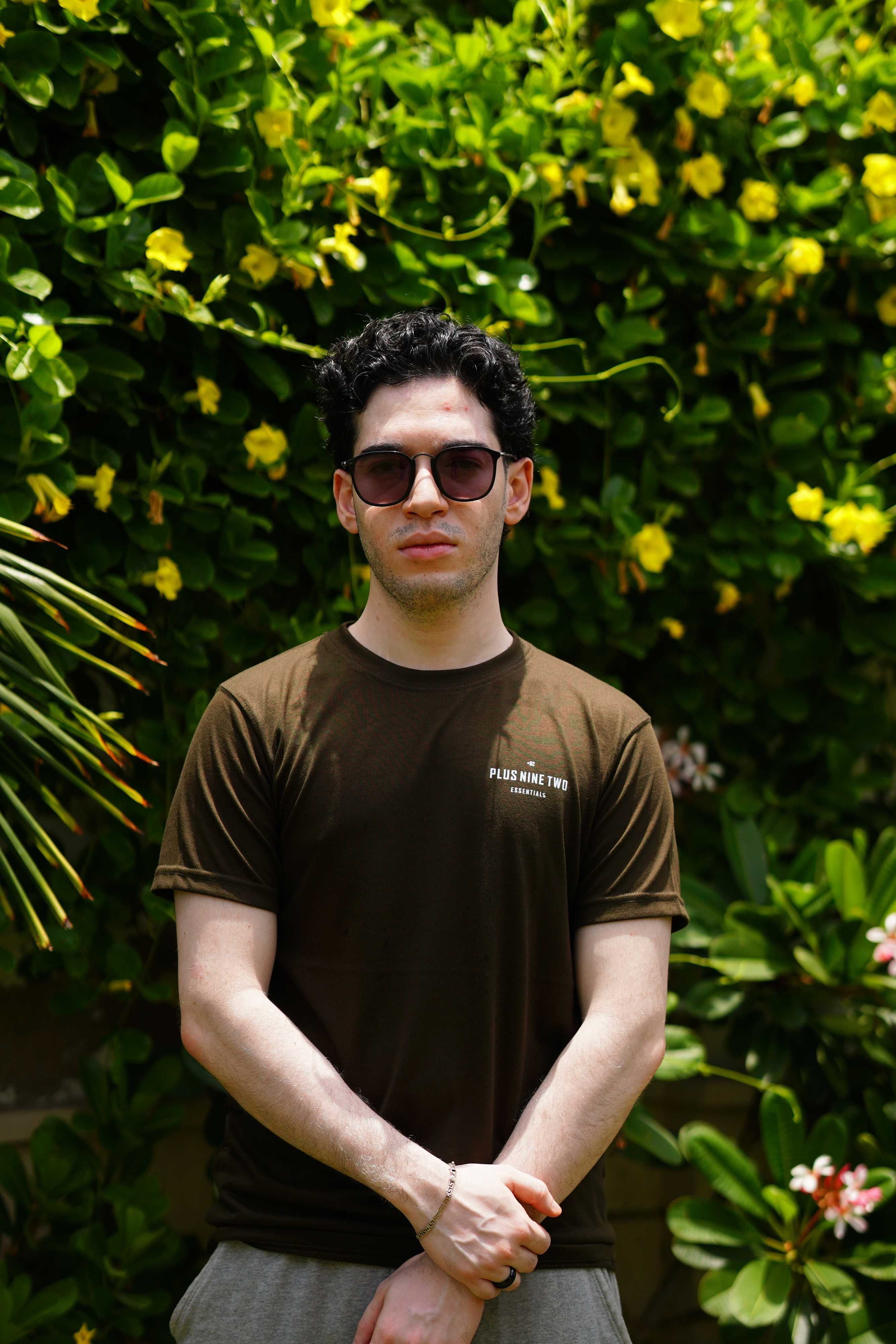 Man wearing Army Green Essentials Blend T-shirt