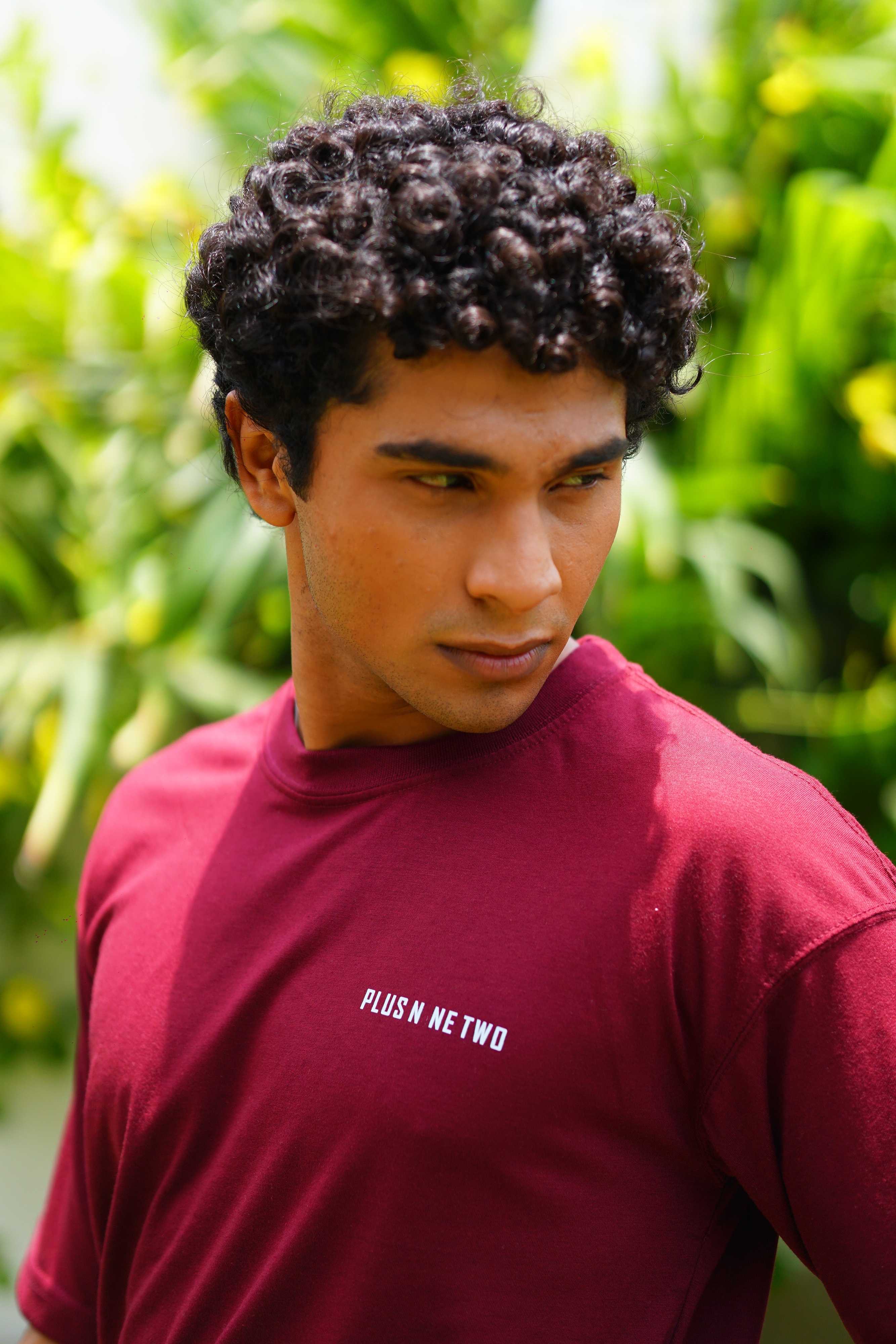 Close-up lifestyle shot of Plus Nine Two Ajrak Maroon Dropshirt for men