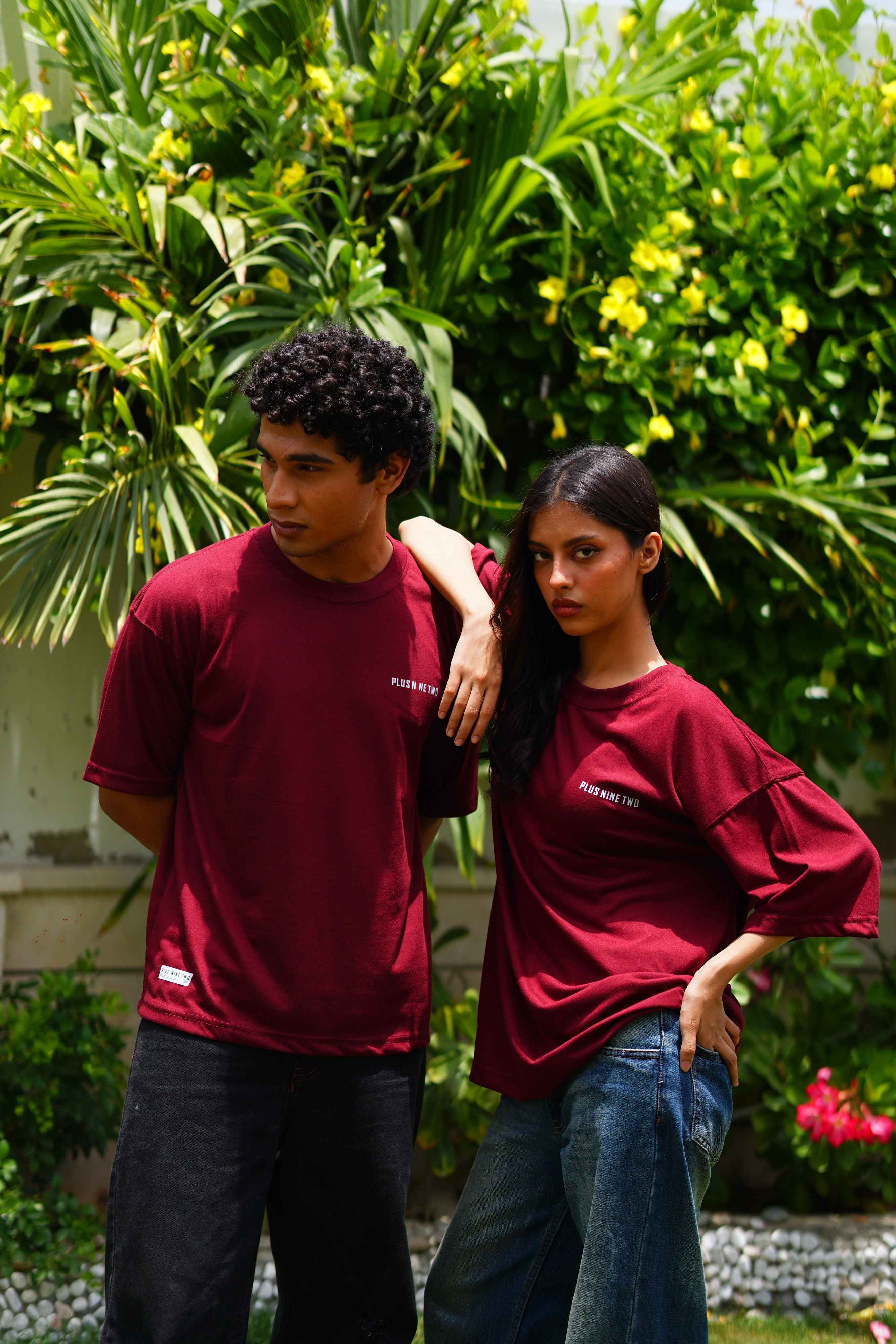 Male and female models wearing Ajrak Maroon Essentials Dropshirts by +92 Clothing