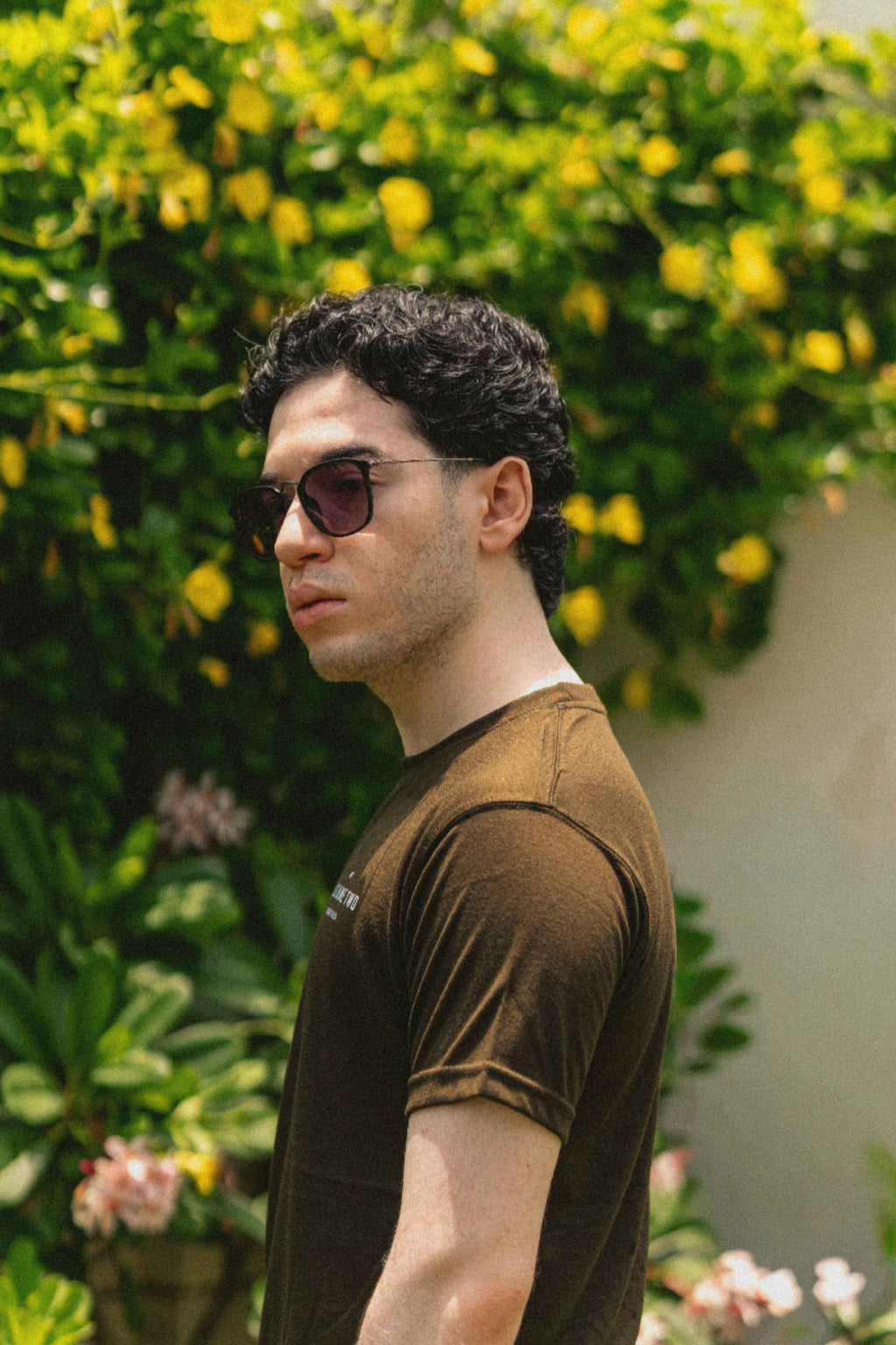 Men’s Army Green Essentials Blend T-Shirt close-up side angle with sunglasses