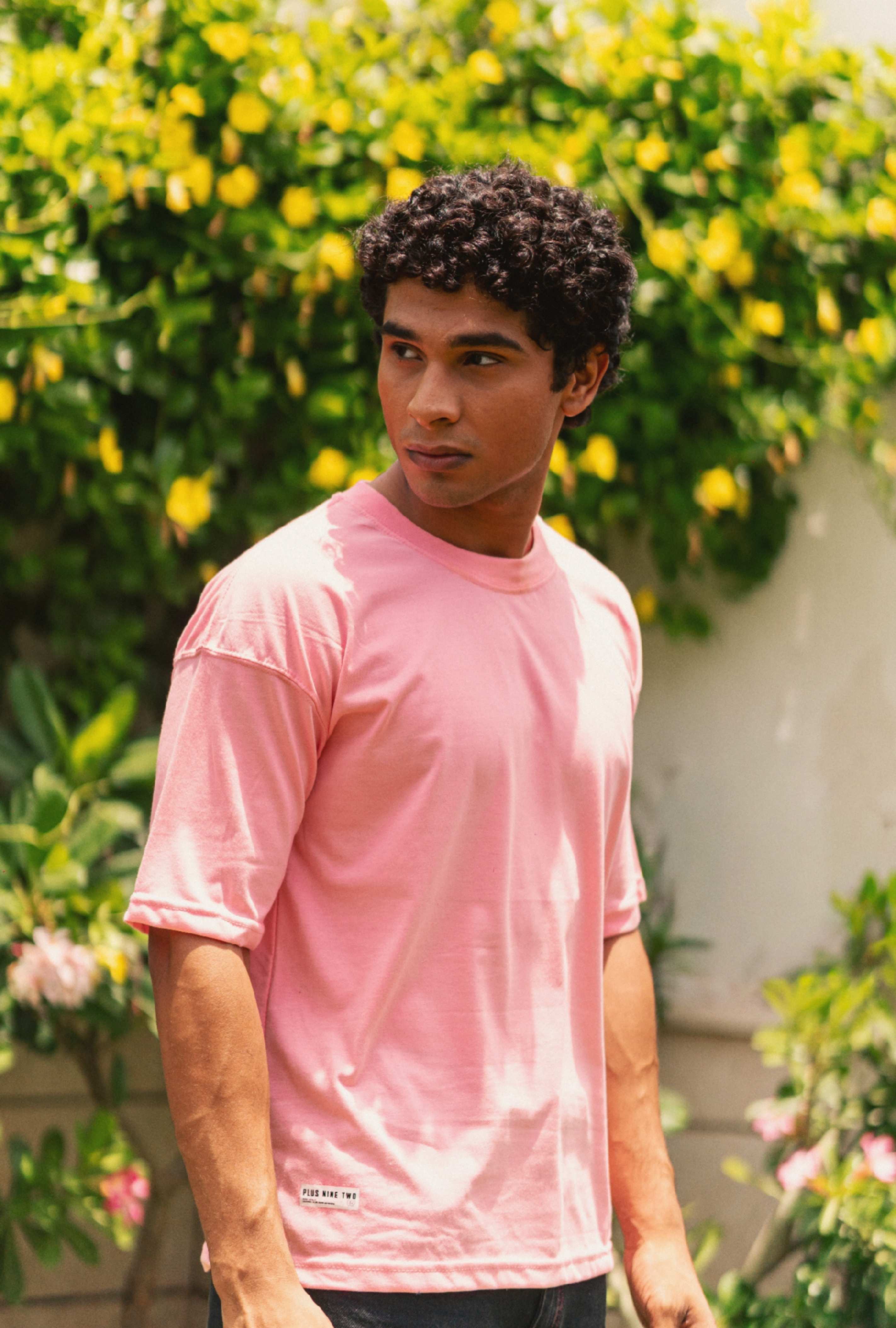 Men’s Baby Pink Essentials Dropshirt front lifestyle product photo