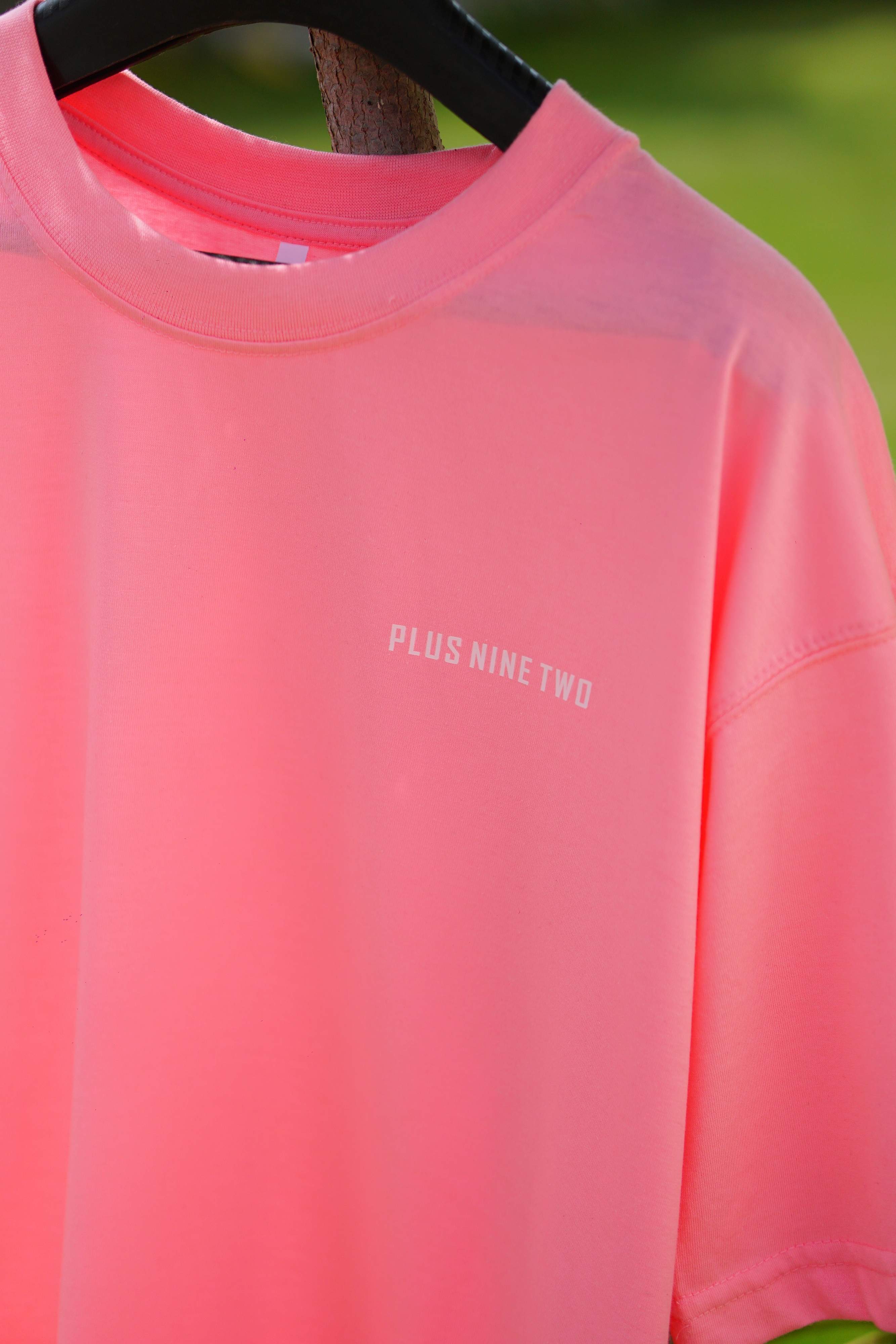 Baby Pink Essentials Dropshirt close-up with Plus Nine Two chest logo