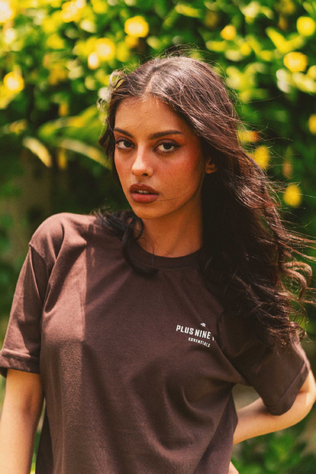 Close-up of Women’s Karak Brown Blend T-Shirt with +92 chest logo