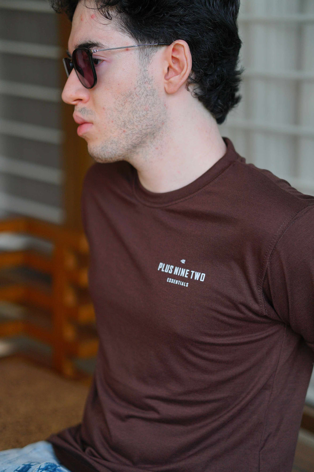 Men’s Karak Brown Blend T-Shirt close-up side angle with chest logo