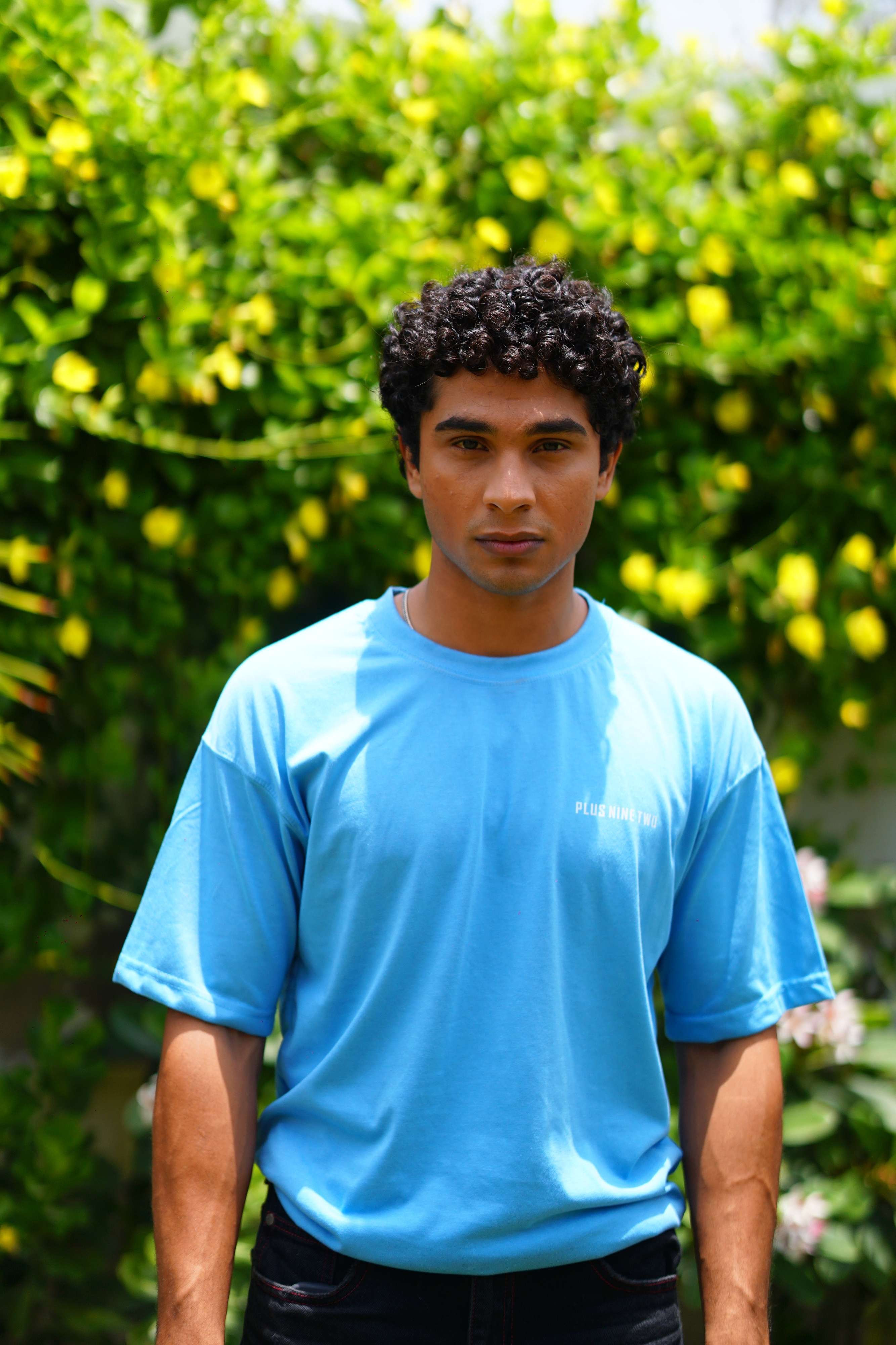 Front view of male model wearing K2 Cloud sky blue oversized t-shirt for men