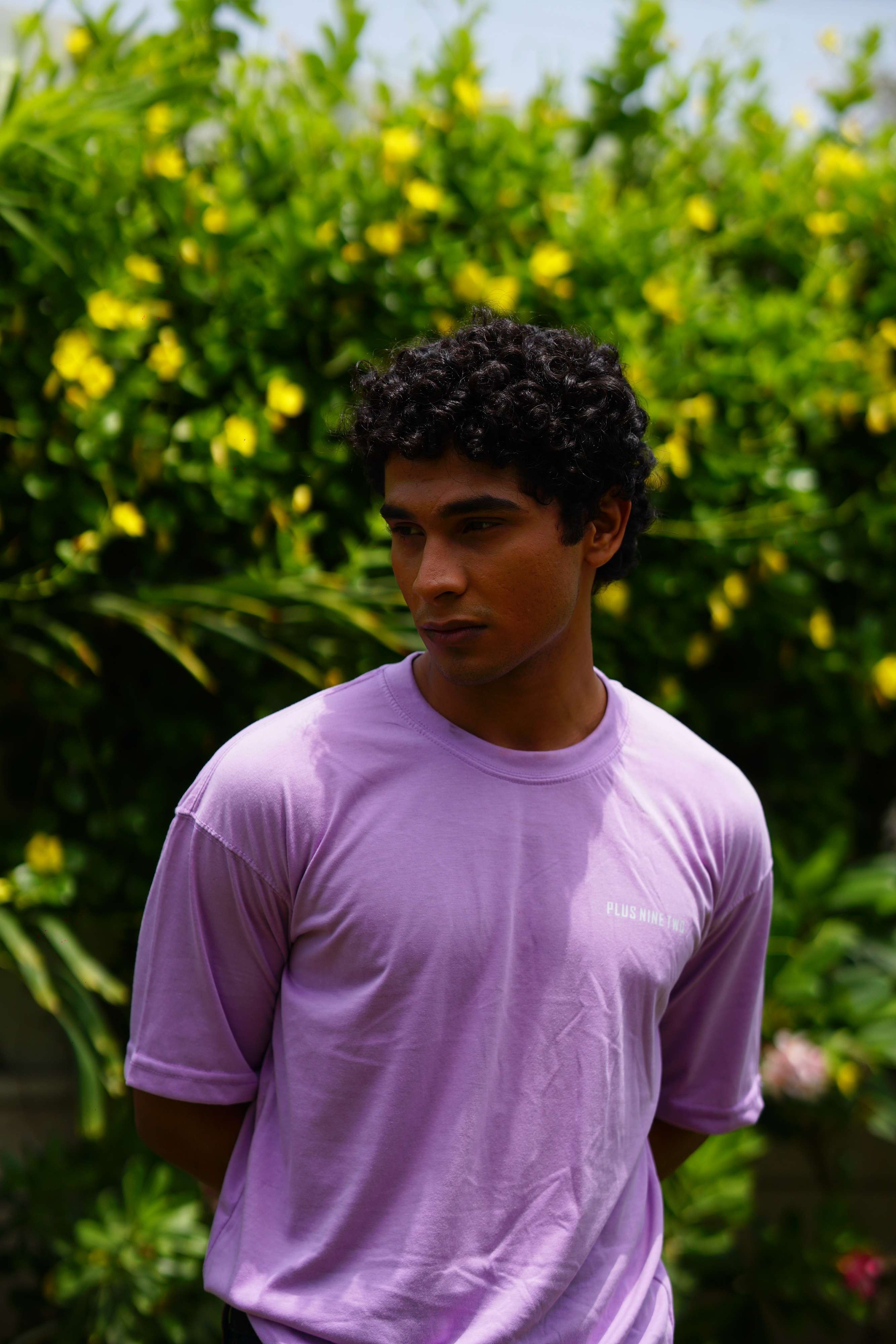 Male model wearing Lahore Lilac oversized dropshirt for men by +92 Clothing