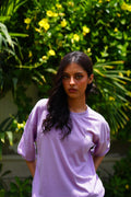 Women’s Lahore Lilac Essentials Dropshirt front view in garden photoshoot