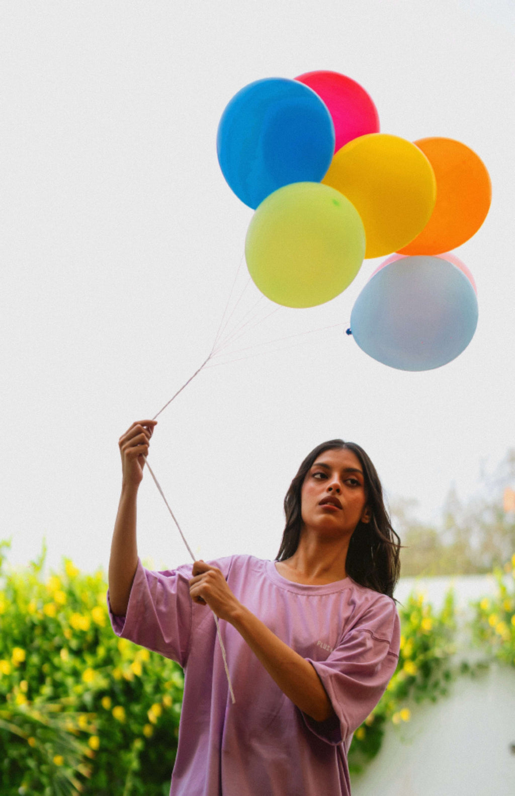 Women’s Lahore Lilac Essentials Dropshirt portrait with balloons