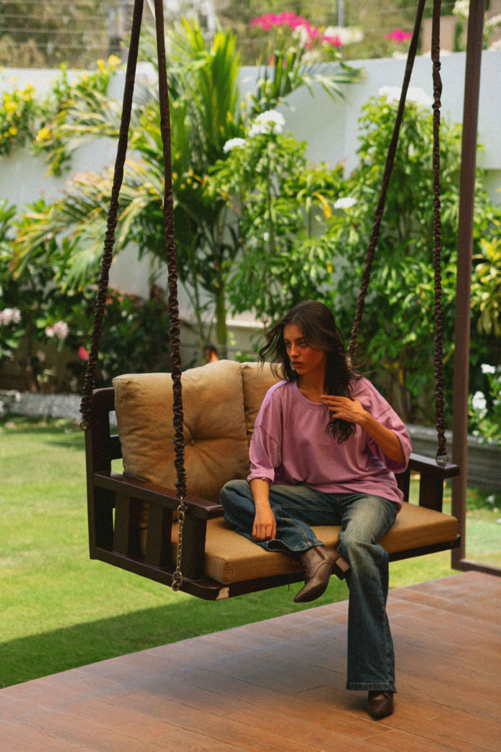 Women’s Lahore Lilac Essentials Dropshirt seated outdoor lifestyle shot