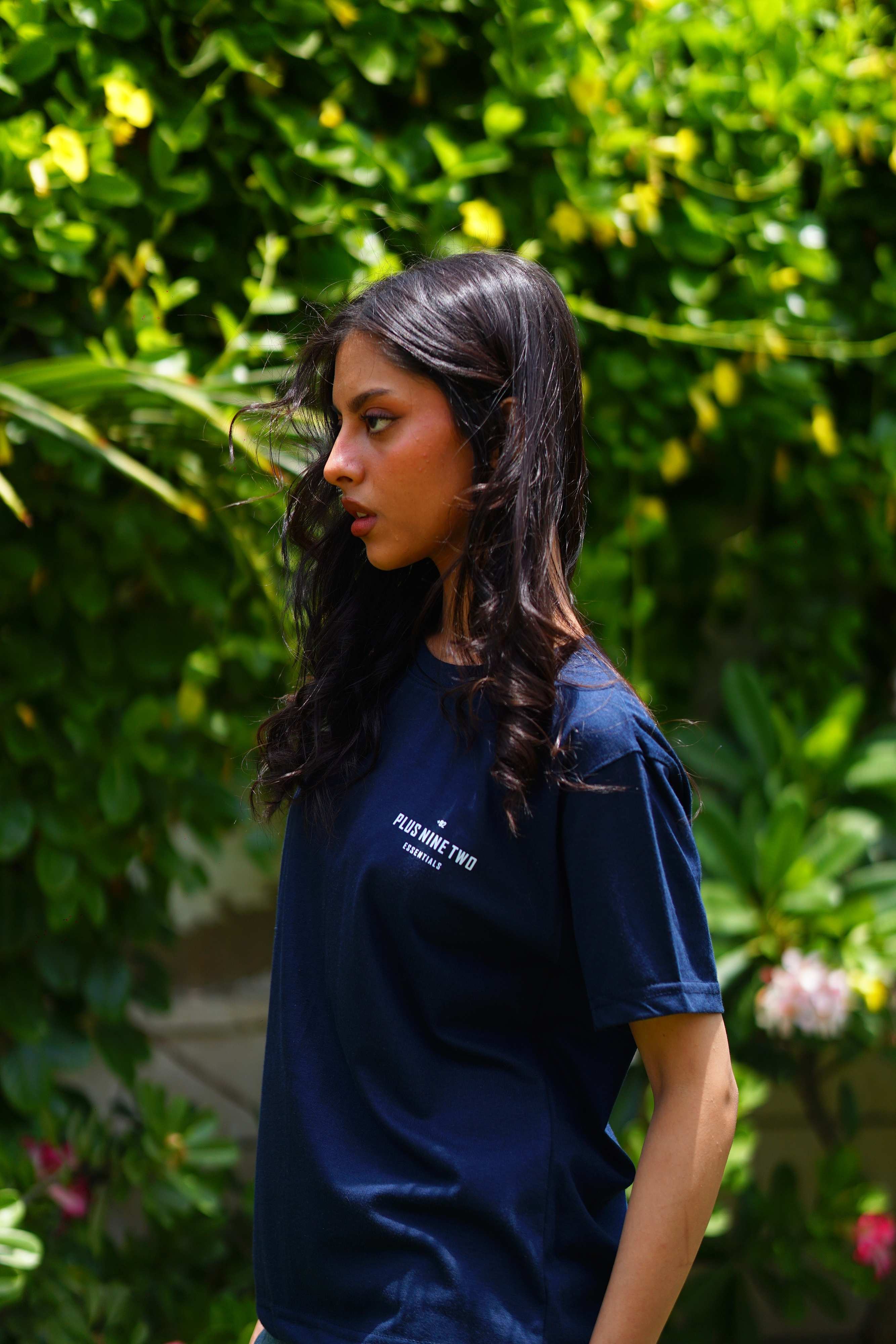 Side profile of Women’s Indus Navy Blue Blend T-Shirt in garden setting
