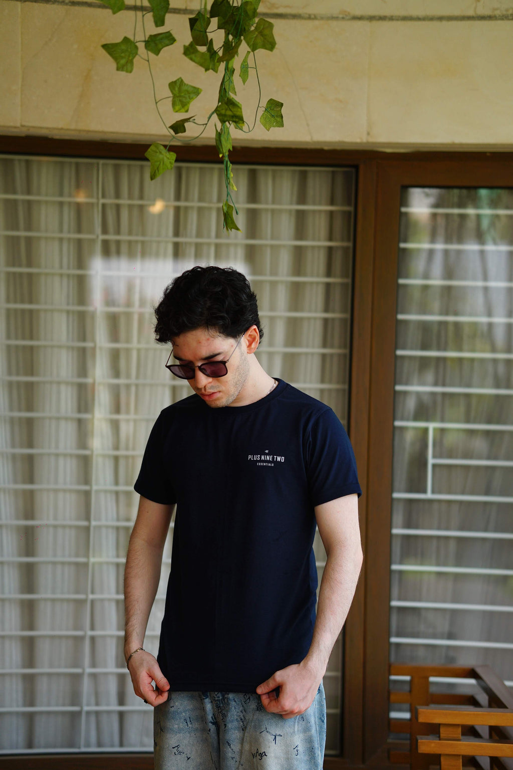 Men’s Indus Navy Blue Blend T-Shirt front view with hands clasped