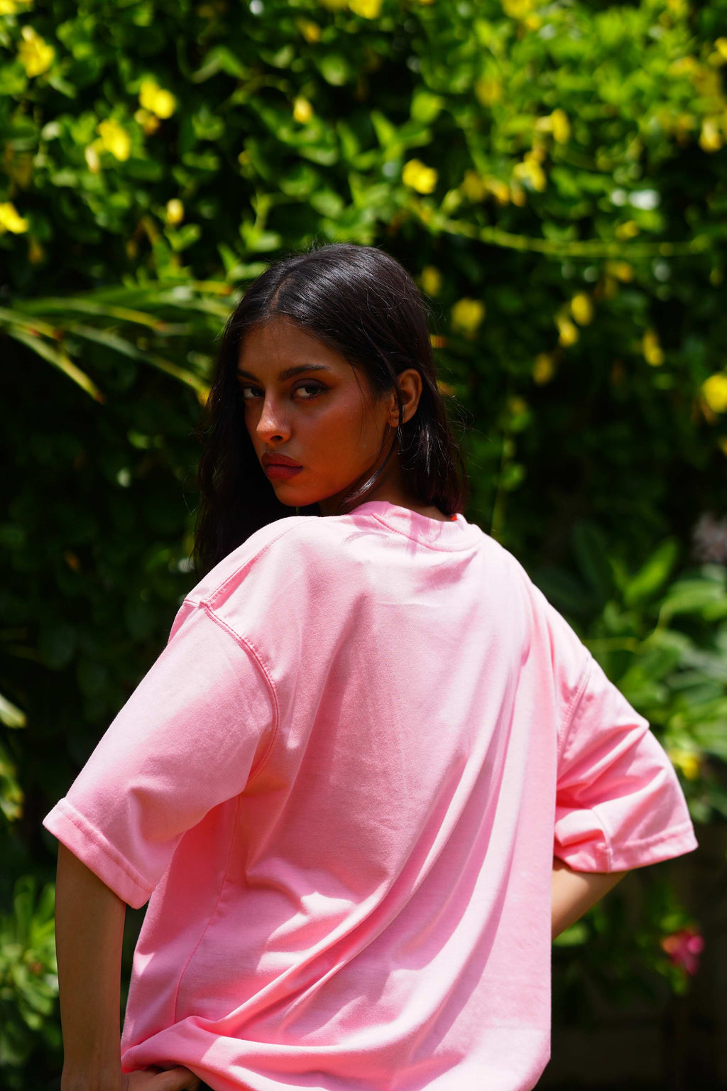 Rear lifestyle shot of Baby Pink Essentials Dropshirt for women by Plus Nine Two
