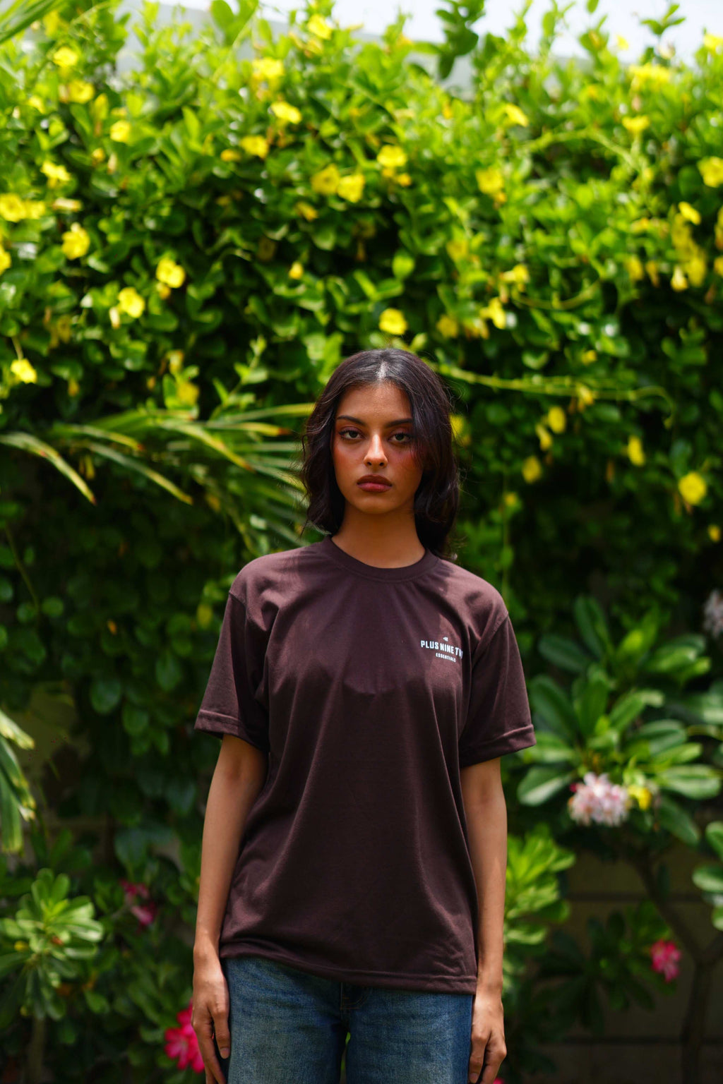 women standing in garden wearing essentials karak brown blend t-shirt