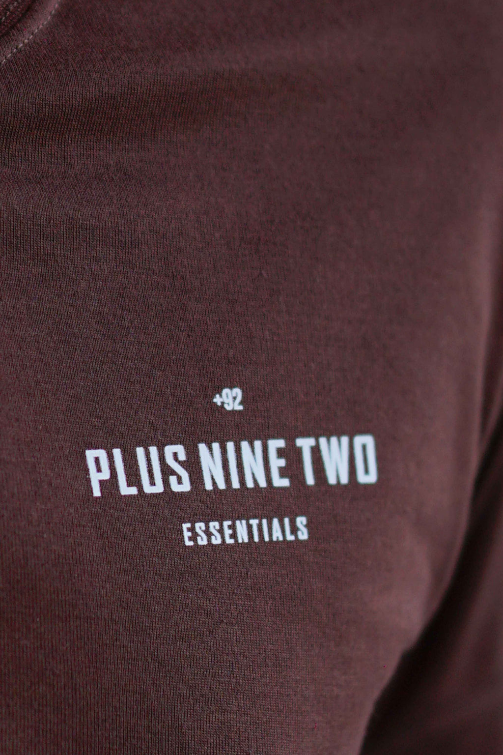 Close-up of pocket print, karak brown men blend t-shirt worn.